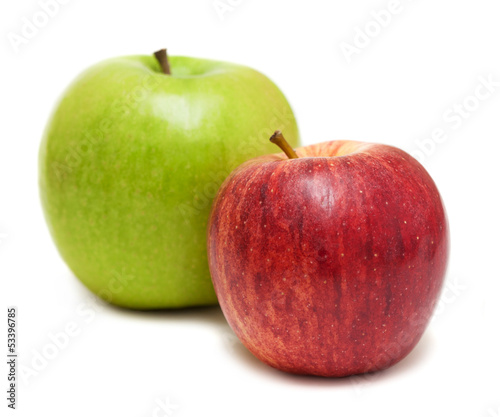 red and green apples over white background