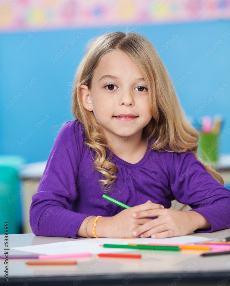 Girl With Colored Sketch Pens And Paper At Desk Girl With Colored Sketch Pens And Paper At Desk