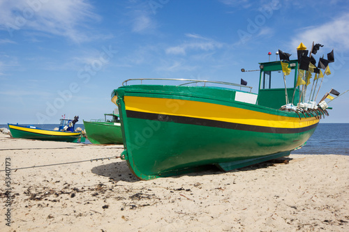 Fototapeta Naklejka Na Ścianę i Meble -  colorful fisher boats on Baltic beach