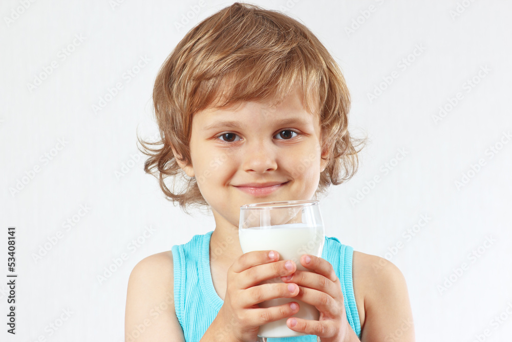 Little boy is going to drink a fresh milk Little boy is going to drink a fresh milk