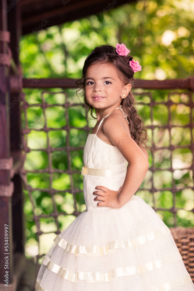 Charming little girl in a beautiful dress outdoor Charming little girl in a beautiful dress outdoor