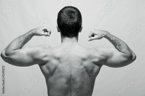Rear view of a young male bodybuilder