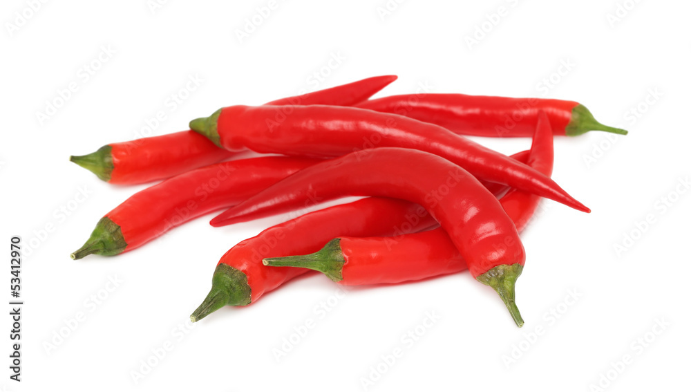 Pile of red chilli peppers on white background