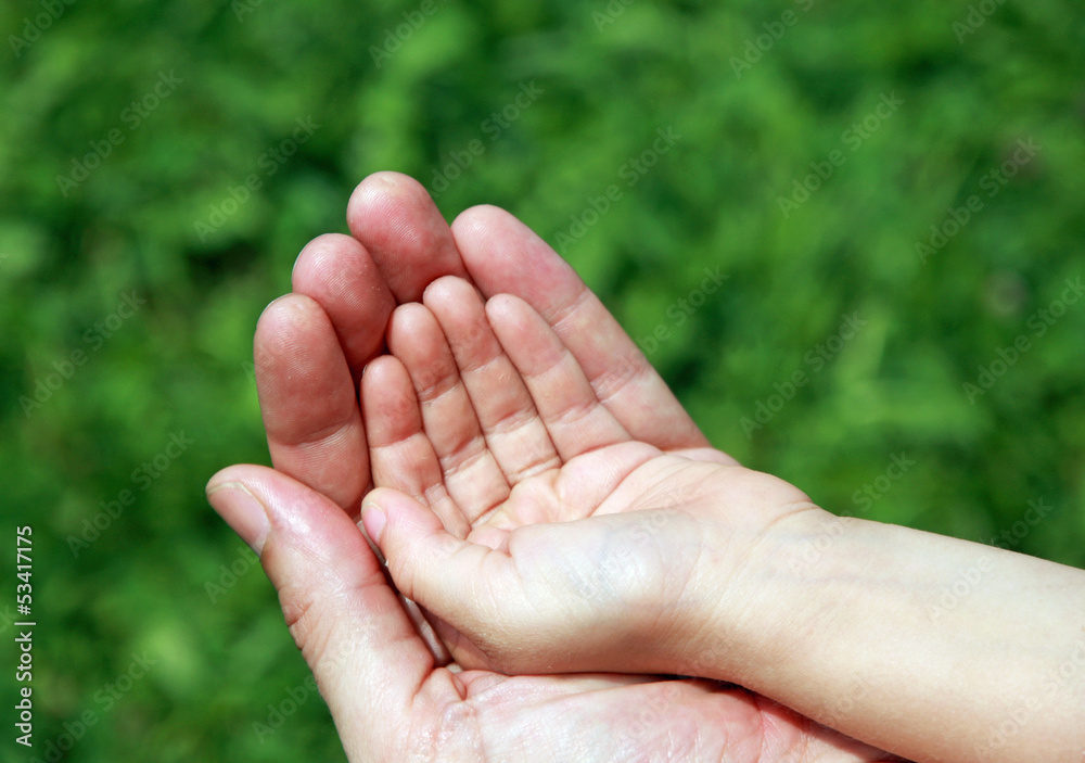Big Daddy's hand holding the hand of her baby Big Daddy's hand holding the hand of her baby