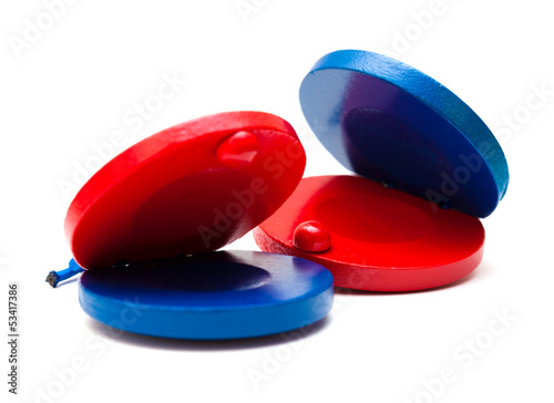 pair of red and blue castanets photo