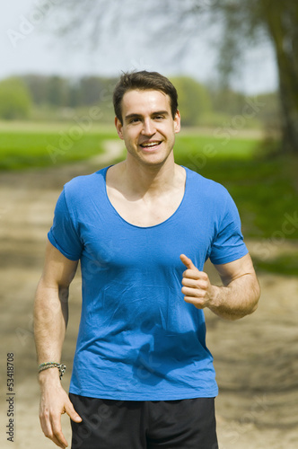 smiling man jogging