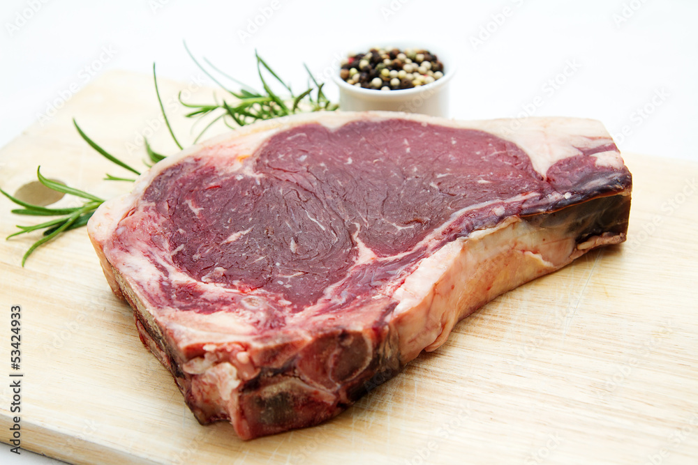 Raw dry aged t-bone steak