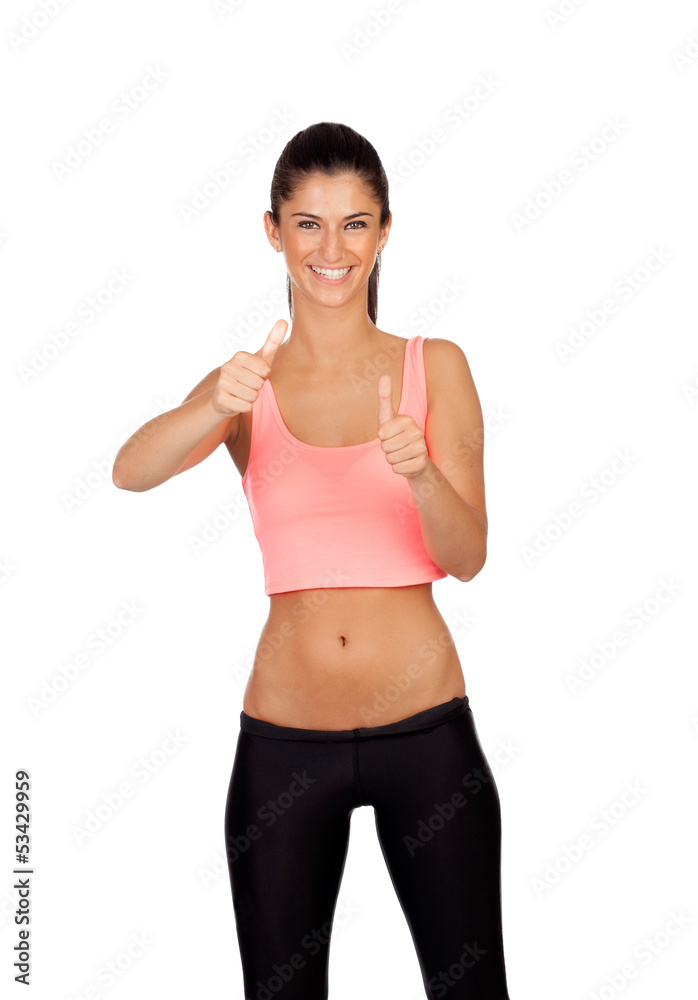 Attractive girl with sports clothes saying Ok Attractive girl with sports clothes saying Ok