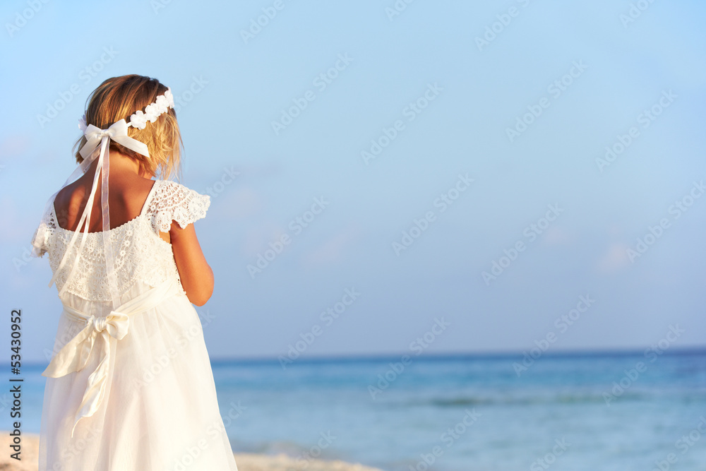 Bridesmaid Standing On Beach At Wedding Ceremony Bridesmaid Standing On Beach At Wedding Ceremony