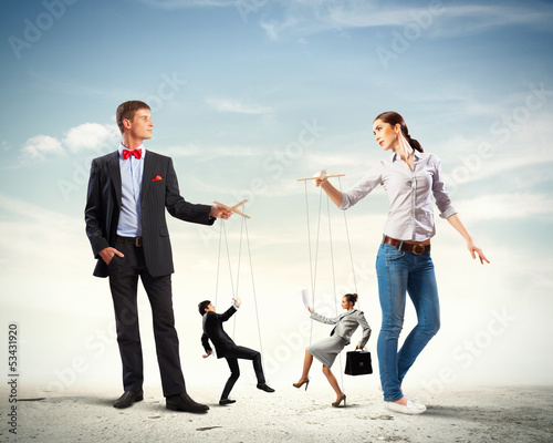 Bild auf Leinwand Businesspeople with marionettes