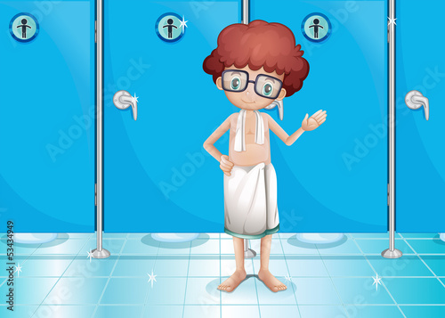 A small boy in the restroom