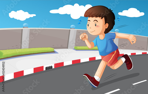 A young boy running at the street