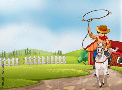 A cowboy holding a rope riding on a horse
