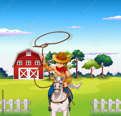 A young cowboy in the ranch