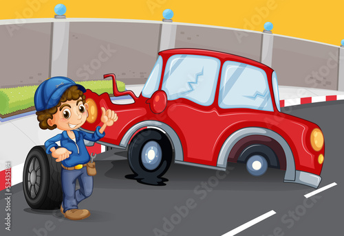 A boy near the car accident at the road