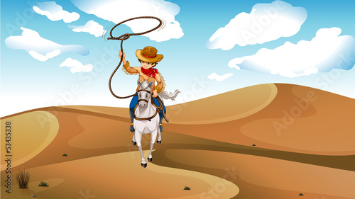 A cowboy with a horse at the desert