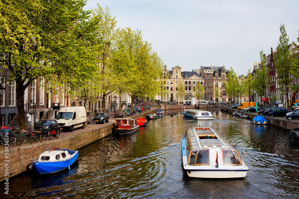 Boats on Canal Tour in Amsterdam