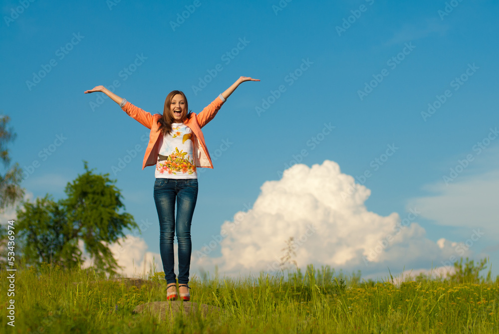 happy teenage girl jumping on the summer outdoors background happy teenage girl jumping on the summer outdoors background