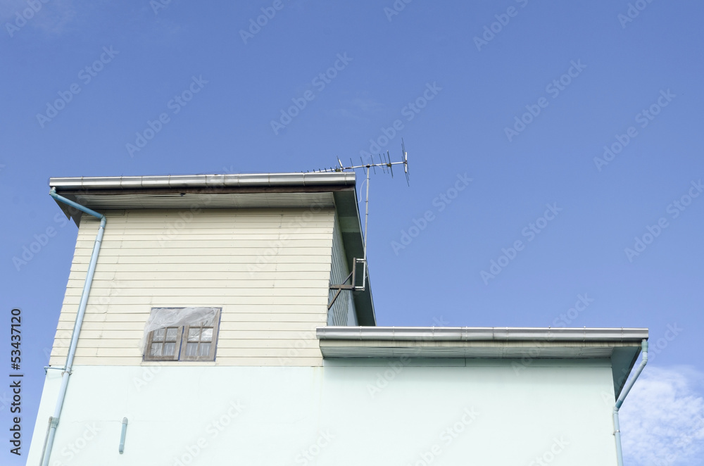 Asian house under blue sky with clouds Asian house under blue sky with clouds