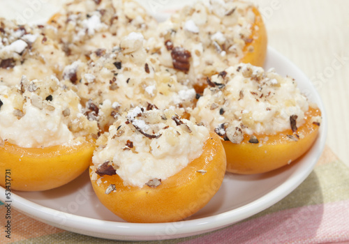 Apricots stuffed with cream cheese and walnuts.
