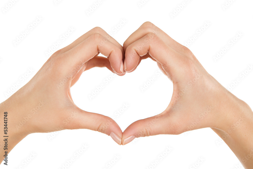Close up of female hands making heart shape Close up of female hands making heart shape