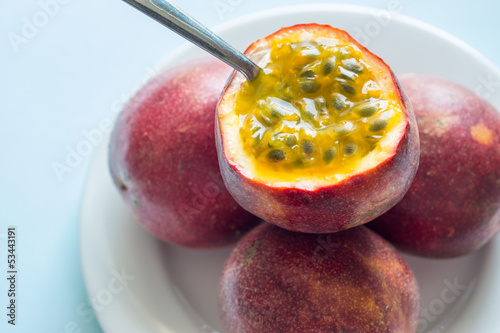 Passion fruit with a spoon