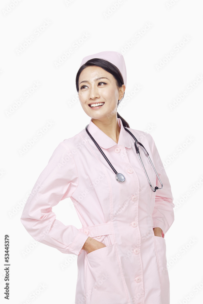 Portrait of young nurse, studio shot, China Portrait of young nurse, studio shot, China
