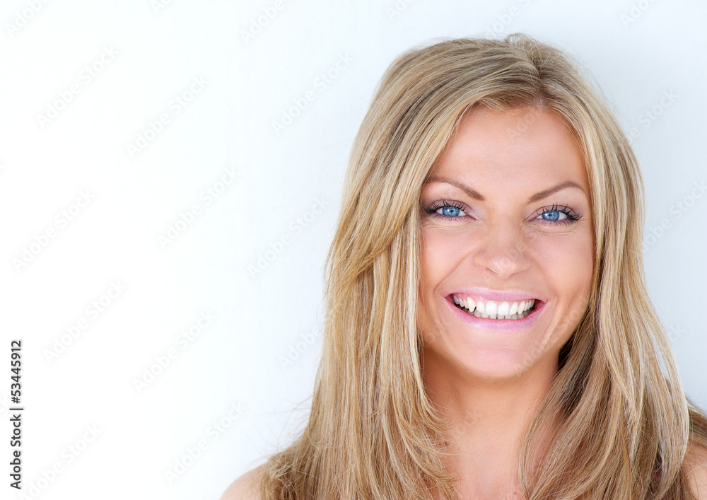 Portrait of a beautiful blond woman laughing Portrait of a beautiful blond woman laughing