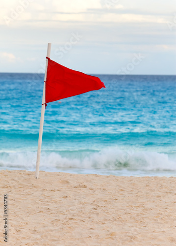 Red flag on the beach