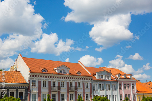 Houses in Vilnius with Cloudy Sky on Background