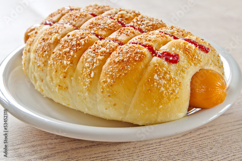 bread with sausage or hotdog photo