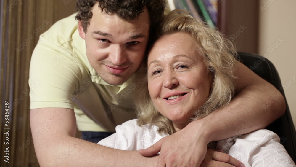 Son hugs his mother 1 Son hugs his mother 1