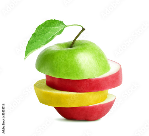 Green, red and yellow slices of apple