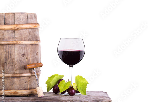 Red wine  glass and cask with grapes