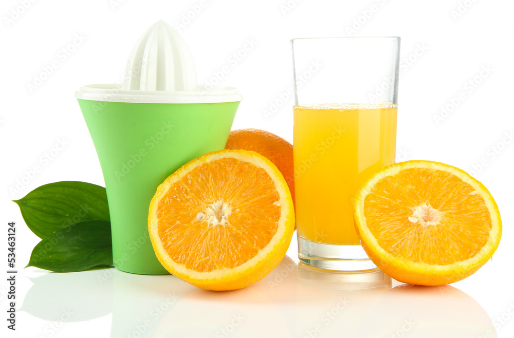 Citrus press, glass of juice and ripe oranges, isolated on Citrus press, glass of juice and ripe oranges, isolated on