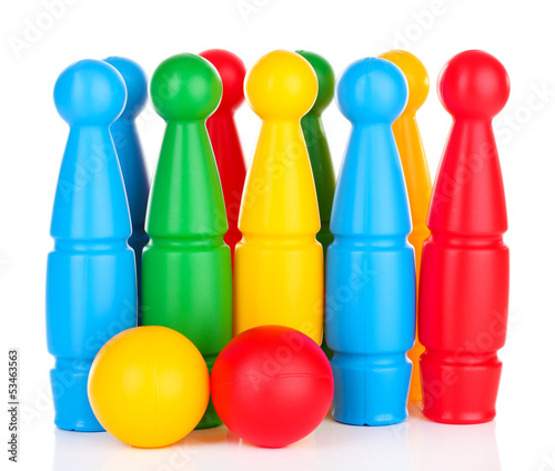 Colorful plastic skittles of toy bowling isolated on white © Africa Studio