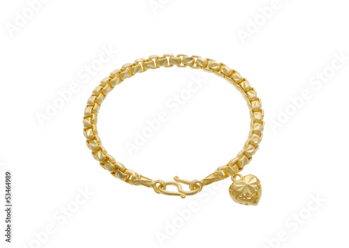 The attractive golden bracelet with a heart shape pendant