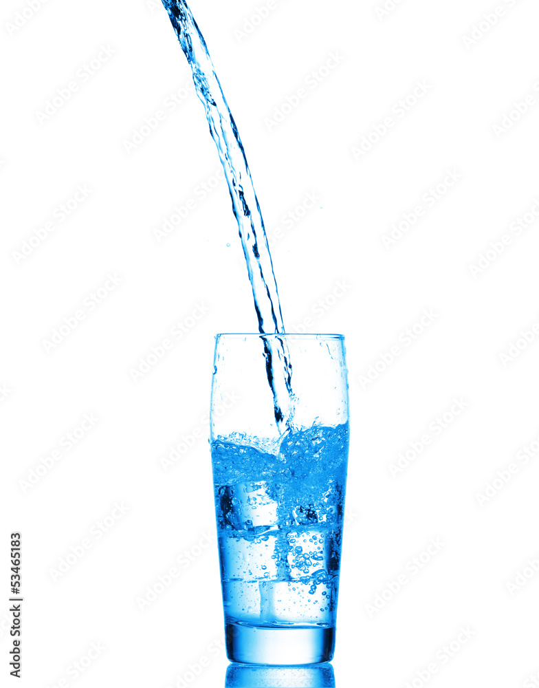 Water splashes in the glass on white background