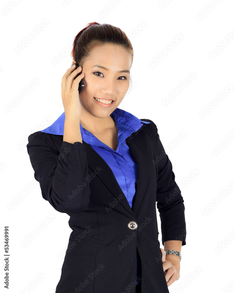 Isolated young business woman has a conversation on a mobile pho Isolated young business woman has a conversation on a mobile pho