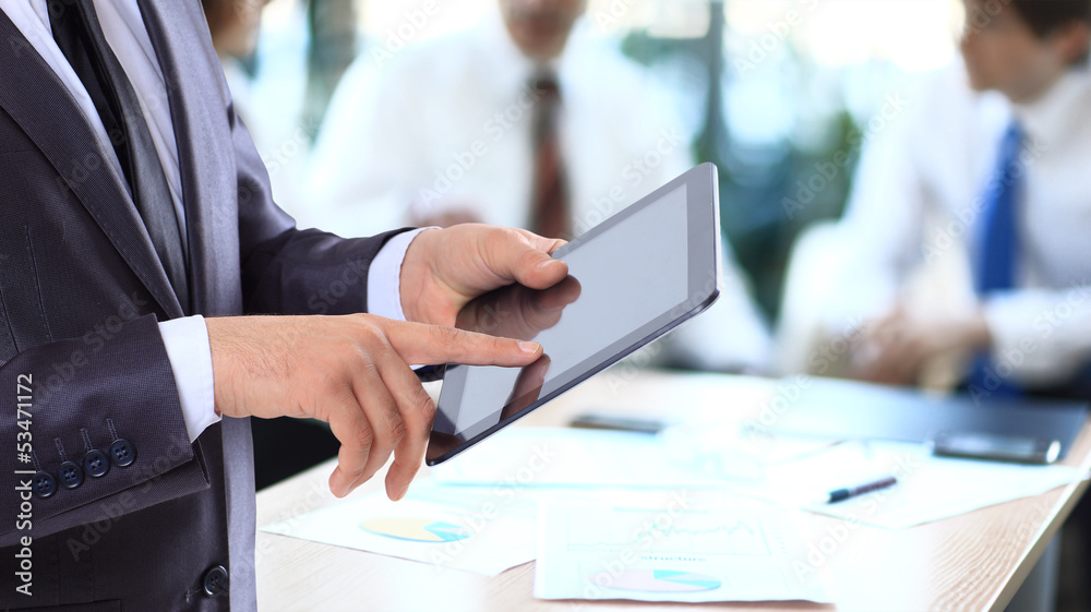 Businessman with the tablet. Businessman with the tablet.