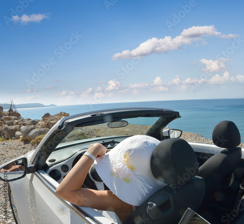The girl, a car, and the sea