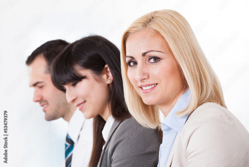 Close Up Of Happy Business People In A Row Close Up Of Happy Business People In A Row