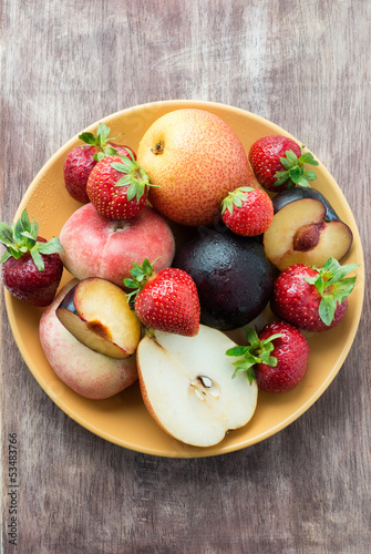 Fresh summer fruits in plate