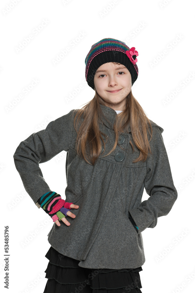Smiling young girl in autumn clothing Smiling young girl in autumn clothing