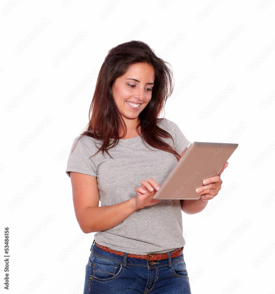 Charming young woman using her tablet pc Charming young woman using her tablet pc