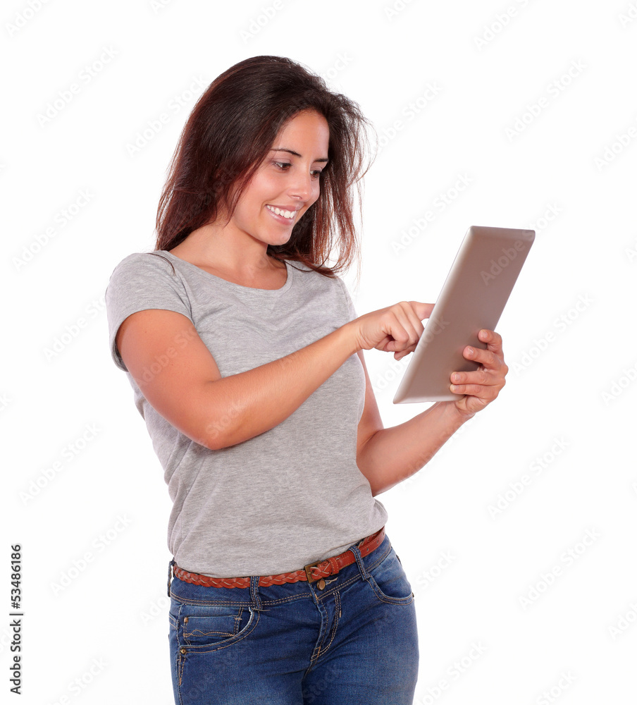 Fototapeta premium Charming young woman working on tablet pc