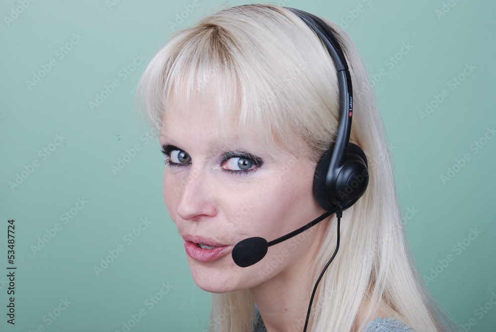 Portrait of young woman with headset Portrait of young woman with headset