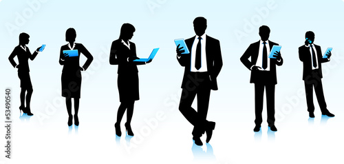 Businessmen and businesswomen with computers