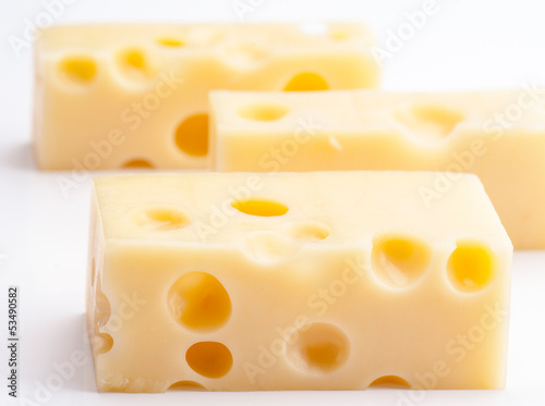Emmental cheese portions on white base
