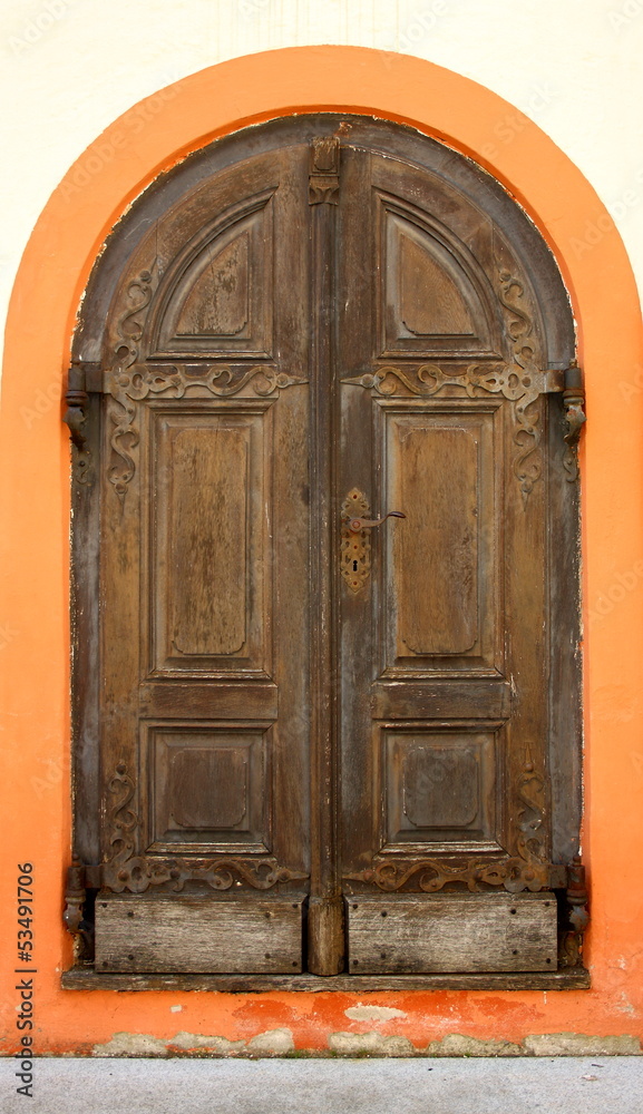 Old wooden doors in Andechs monastery as background Old wooden doors in Andechs monastery as background